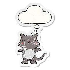 cartoon cat and thought bubble as a distressed worn sticker