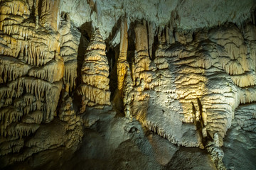 Stalactites and stalagmites underground in cave system in Postojna