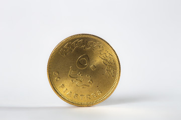 50 piastre Egyptian coin front isolated on a white background