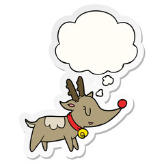 cartoon christmas reindeer and thought bubble as a printed sticker