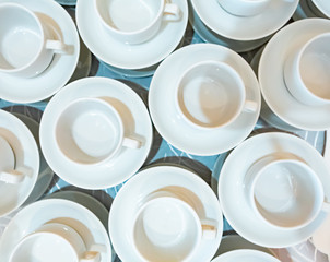 cups for coffee or tea, top view. background with cups many cups background, top view