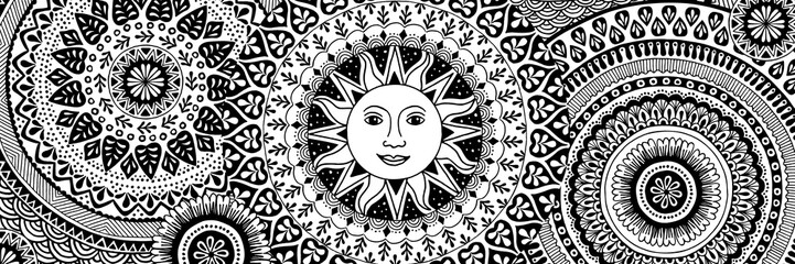 Web banner with hand drawn mandalas, black and white ink illustration with a sun in the center