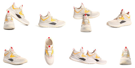 Set of comfortable modern sports shoes on white background