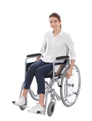 Obraz na płótnie Canvas Young woman in wheelchair isolated on white