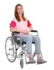 Beautiful woman in wheelchair isolated on white
