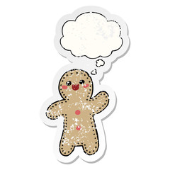 cartoon gingerbread man and thought bubble as a distressed worn sticker