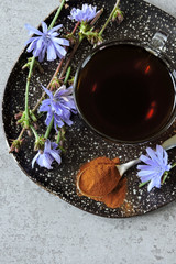 Obraz na płótnie Canvas Chicory drink. Chicory flowers. Chicory powder. Healthy drink concept. Keto drinks.