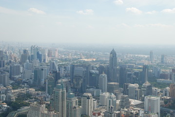 Fototapeta na wymiar Wonderful view of the huge Bangkok from the top floor of the skyscraper
