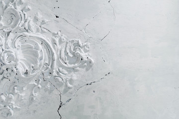 Elements of architectural decorations of buildings inside on the ceiling, gypsum stucco, wall white...