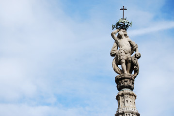 Fototapeta na wymiar statue with blue sky and clouds