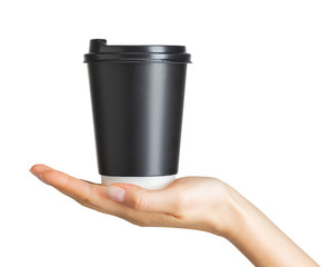 Woman hand holding coffee paper drinking cup