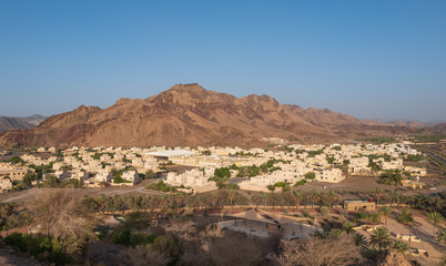 View from the top on town of Hatta and rocks in the background. Hatta is an enclave of Dubai in the Hajar Mountains, United Arab Emirates