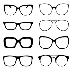 A set of glasses isolated. Vector glasses model icons. Sunglasses, glasses, isolated on white background. Silhouettes. Various shapes - stock illustration.