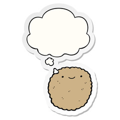 cartoon biscuit and thought bubble as a printed sticker