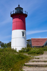 red and white Nauset Lighthouse in Eastham, Massachusetts viewed from below the stairs