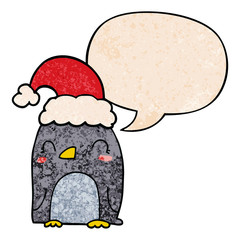 cute christmas penguin and speech bubble in retro texture style