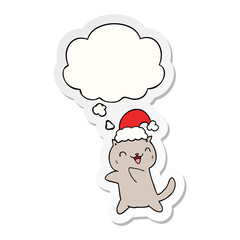 cute cartoon christmas cat and thought bubble as a printed sticker