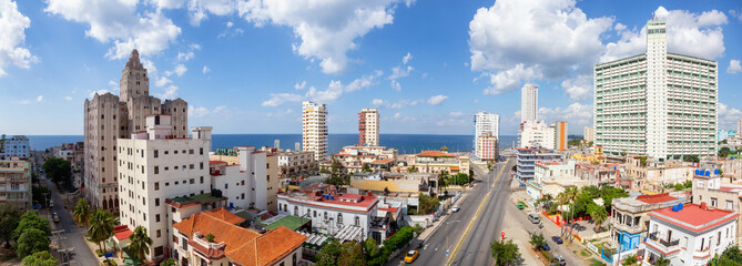 Aerial Panoramic view of the Old Havana City, Capital of Cuba, during a cloudy day. - obrazy, fototapety, plakaty