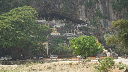Yathaypyan Cave with golden Buddha statues near Hpa-An, Myanmar / Burma.