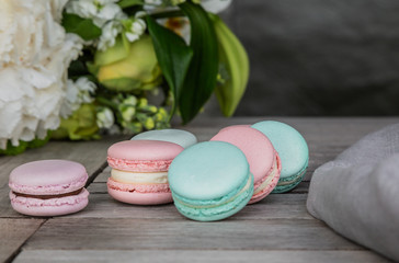 Close up colorful macarons dessert with vintage pastel tones