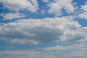Blue sky with white air and lush clouds