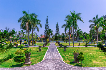 Views of a pathway in the garden at Ujung Water Palace (also known as Ujung Park or Sukasada Park) in Bali, Indonesia