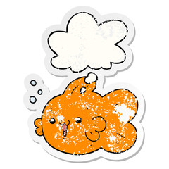 cartoon fish and thought bubble as a distressed worn sticker