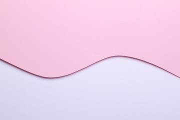 Abstract geometric bright double pastel color flat lay paper background consisting of 2 shades - light pink and white with a place for an inscription.