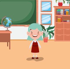 little student girl in the classroom