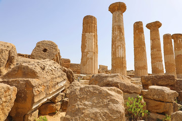 Ruined Temple of Heracles columns in famous ancient Valley of Temples of Agrigento, Sicily, Italy. UNESCO World Heritage Site.