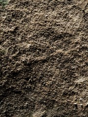 Detailed Rough Gritty Stone or Rock Background or Texture Pattern