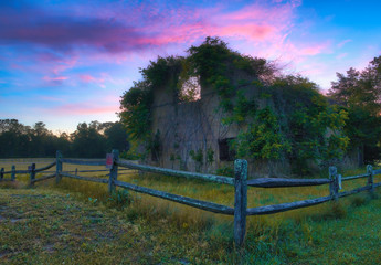 Peaceful sunrise over abandoned ruins of an old building at Pine Barrens, New Jersey. HDR...
