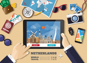 Hand holding smart tablet booking travel destination.Netherland famous places.Vector concept banners in flat style with the set of traveling objects, accessories and tourism icon.