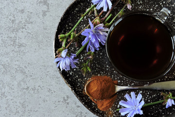 Chicory drink. Chicory flowers. Chicory powder. The concept of a useful diet drink. Coffee...