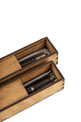 Boxes of wood handmade with gift pens inside on a white background, isolate.