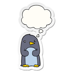 cartoon penguin and thought bubble as a printed sticker