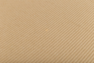 corrugated cardboard for packing. abstract background horizontal lines with wavy lines of beige color