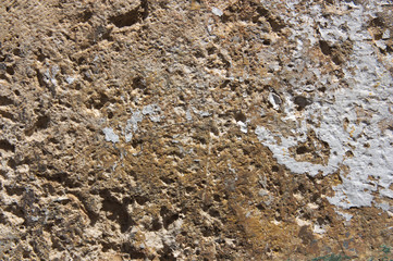 Texture of an old stone wall light tan