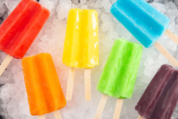 Rainbow Two Stick Popsicles in a a Box of Ice