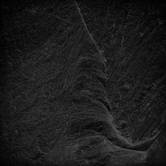 Dark grey black slate background or texture. black stone