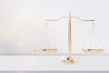 Law scales on table background. Symbol of justice
