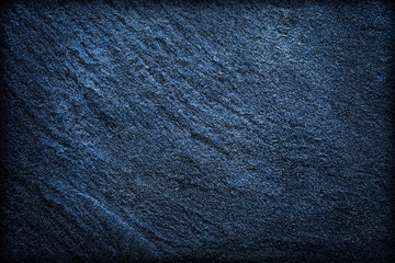 Dark grey navy blue slate background or texture. stone background
