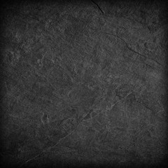 Dark grey black slate background or texture.