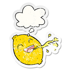 cartoon squirting lemon and thought bubble as a distressed worn sticker