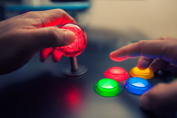 Arcade game machine with huge 45mm red ball top joystick and lighted four button layout. © mmg1design