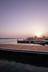 Fototapeta na wymiar sunset at the port