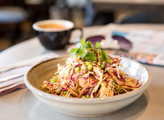 Chinese chicken salad with a cup of coffee. 