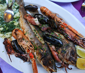 Plate of grilled mixed seafood fresh from the ocean. 