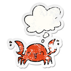 cartoon crab and thought bubble as a distressed worn sticker