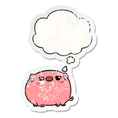 cute cartoon pig and thought bubble as a distressed worn sticker